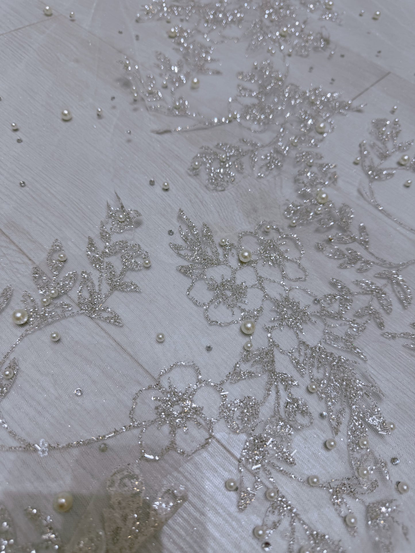 Stock of off white glitter lace with beaded pearl long bridal veil