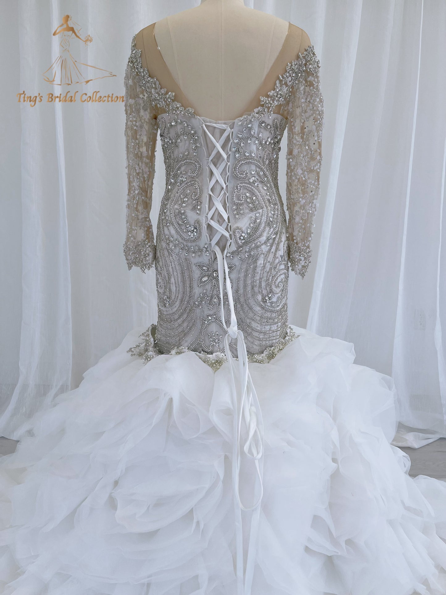 TBC-CM49 Custom-made fully crystal beaded long sleeve mermaid royal wedding dress with detachable ruffles skirt