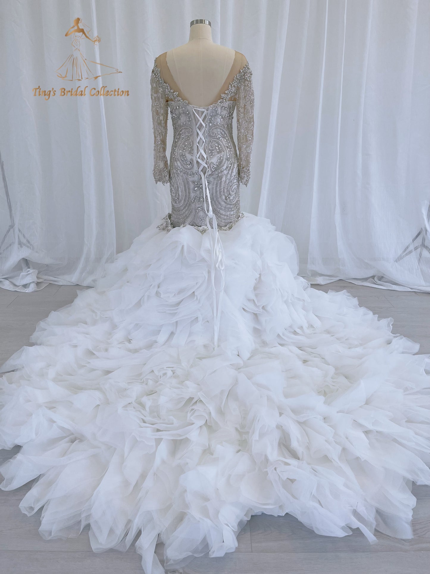 TBC-CM49 Custom-made fully crystal beaded long sleeve mermaid royal wedding dress with detachable ruffles skirt