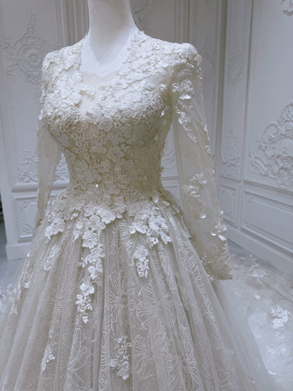 Stock clearance floor sample! Size 2. Ivory long sleeve lace Aline wedding dress